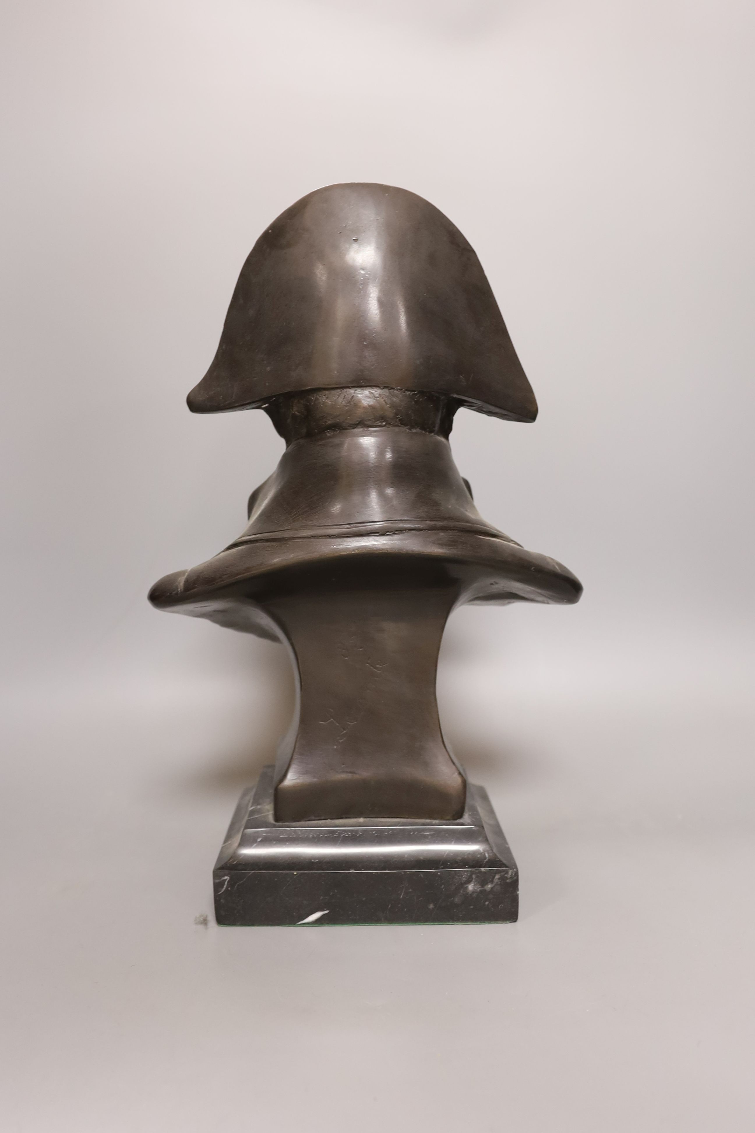 A bronze portrait bust of Napoleon, bearing script mark verso Lecomte 82, on marble plinth, 36cm